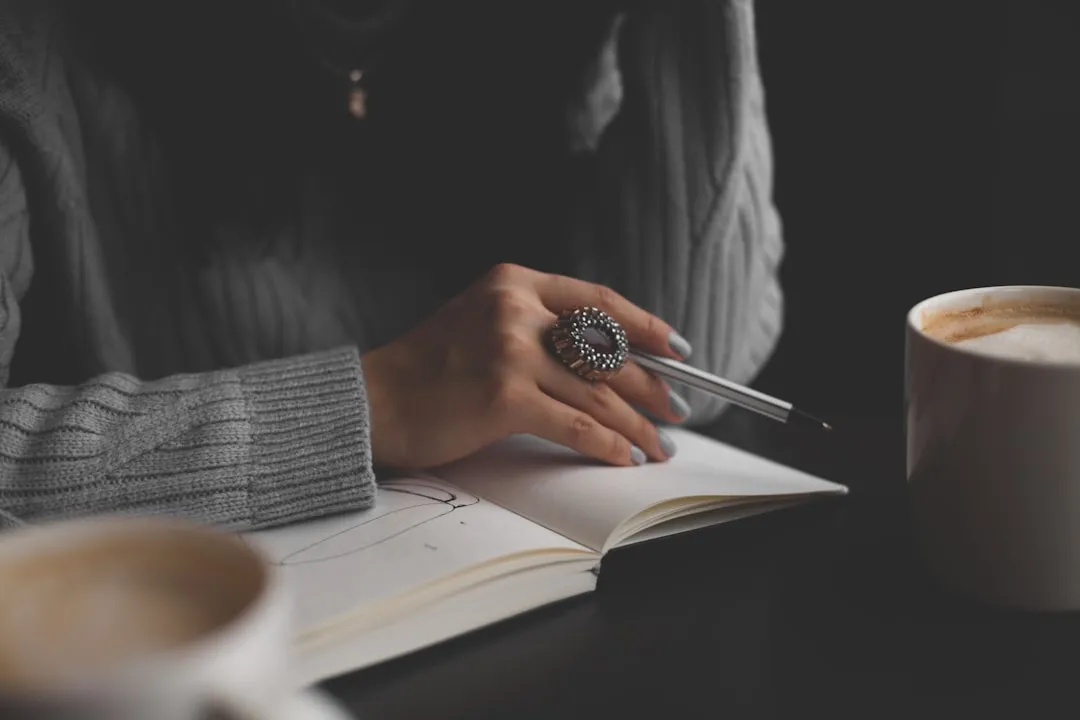 A journal open on a table in soft morning light