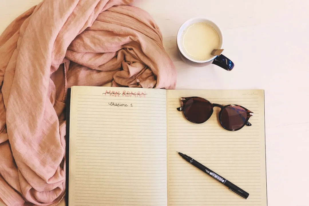 A notebook and pen on a clean desk ready for Sunday planning